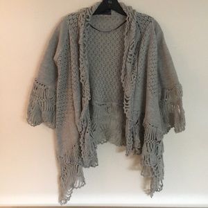 Line knitted drape sweater